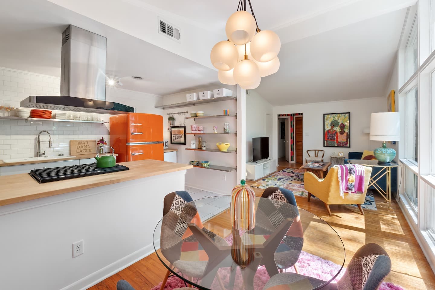 Fully stocked kitchen with breakfast bar, open to the dining room
